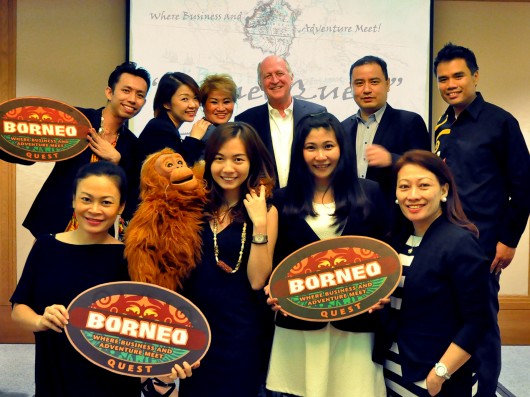 Mike (back row 3rd fm right) and Alice (front 1st right) with the team in Singapore